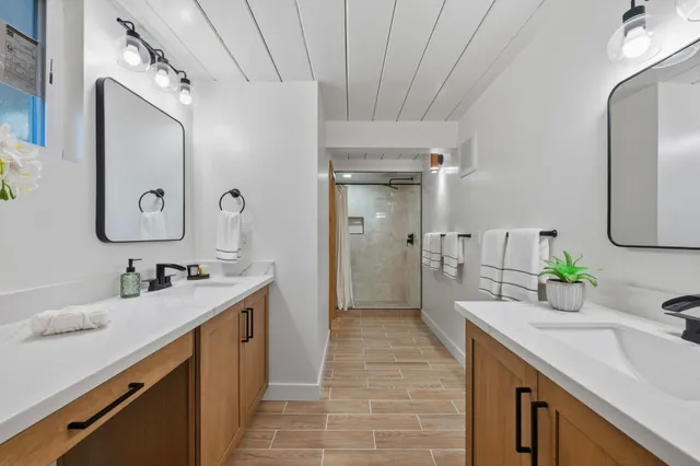 a kitchen with stainless steel appliances granite countertop a stove and a sink