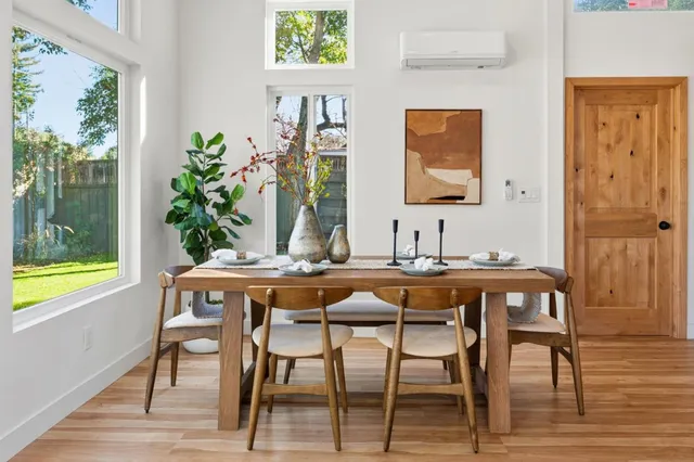 a large kitchen with stainless steel appliances lots of counter space and a sink