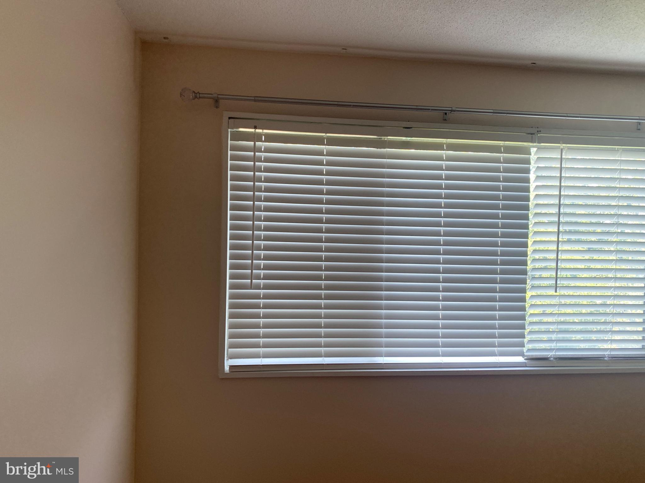 1836 Metzerott Road, Unit 707 Hyattsville, MD 20783 - Photo 3 of 13 Natural light filters through blinds.