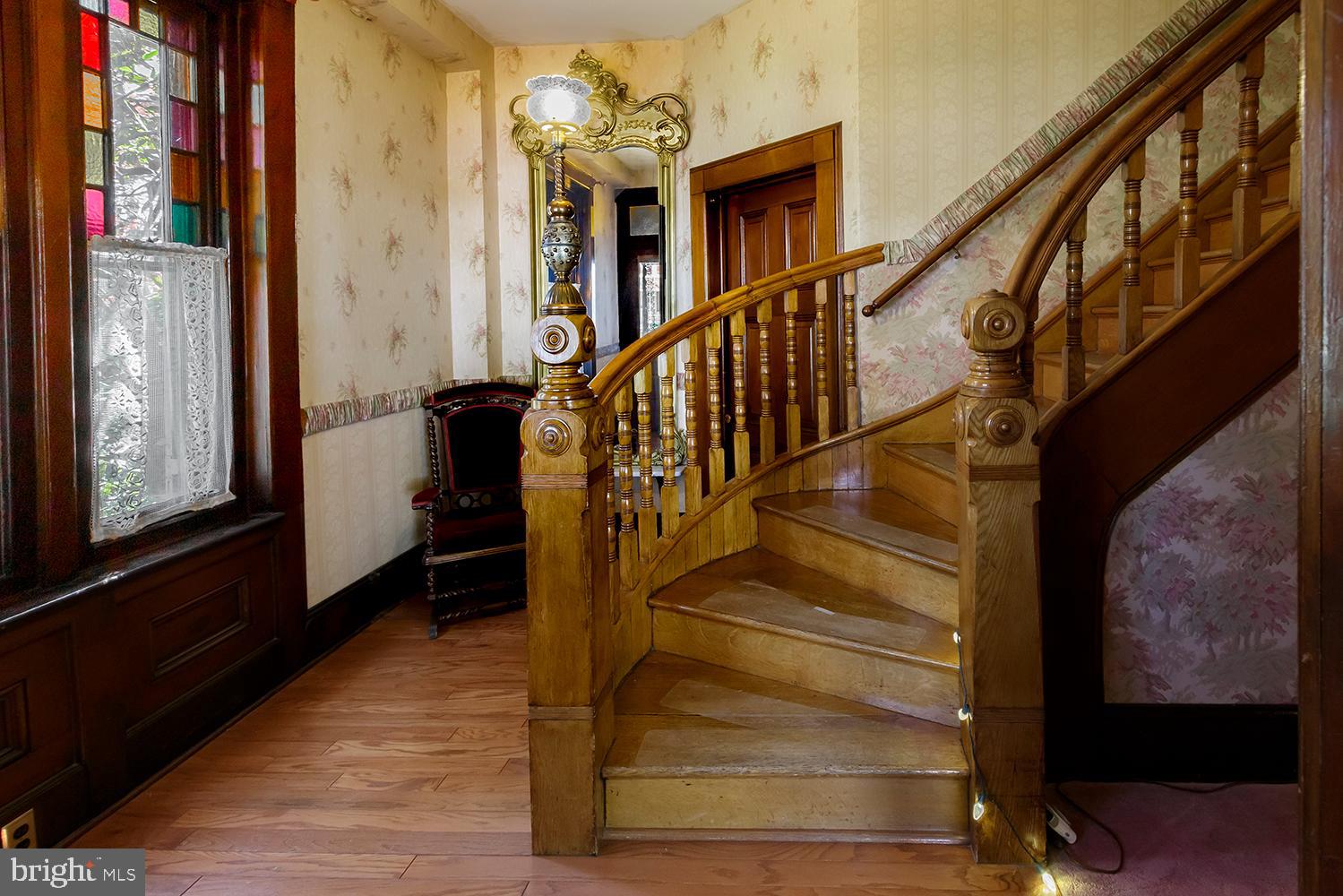 402 High Street Mount Holly, NJ 08060 - Photo 6 of 42 Curved wood staircase to upper level