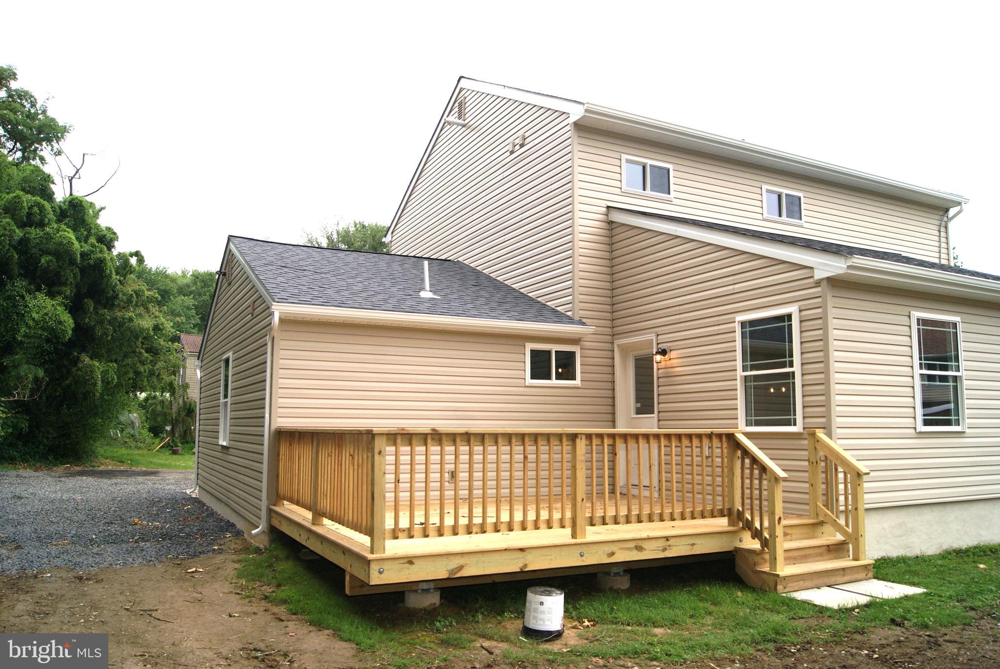 3702 Nichol Street Bristol, PA 19007 - Photo 7 of 7 a view of a house with a yard
