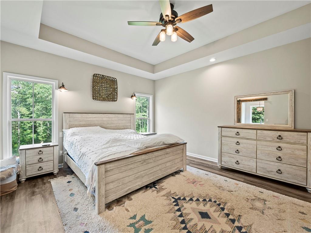 259 Cochran Road Talmo, GA 30575 - Photo 17 of 35 a bedroom with a bed and a dresser