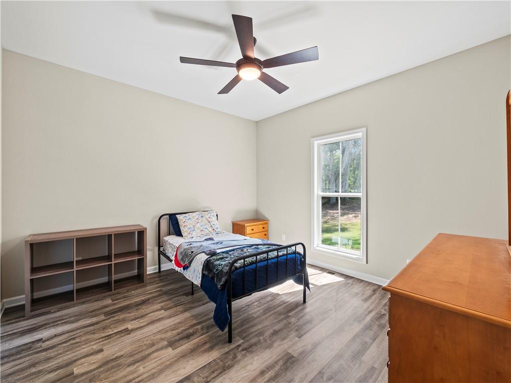 259 Cochran Road Talmo, GA 30575 - Photo 25 of 35 a living room with furniture and a window