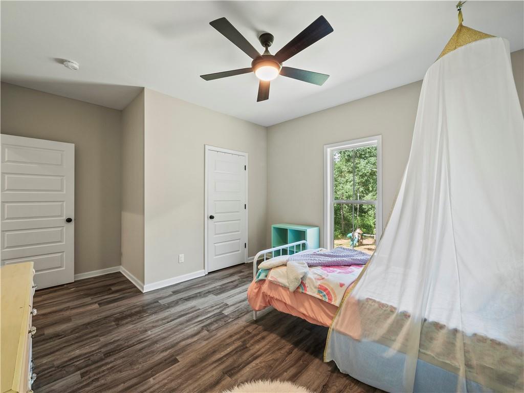 259 Cochran Road Talmo, GA 30575 - Photo 26 of 35 a bed room with a bed and a window