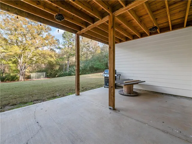 a view of a backyard of the house