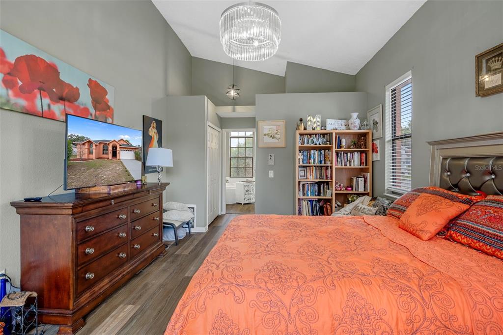 4401 Plumosa Street Spring Hill, FL 34607 - Photo 21 of 38 a bedroom with a bed and closet