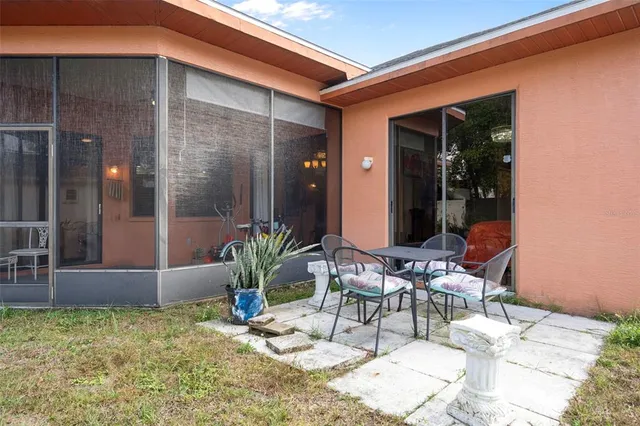 a view of an chairs and tables in the patio