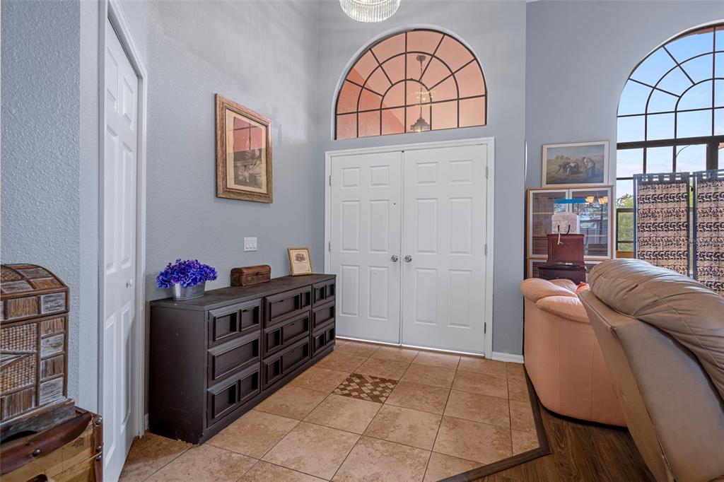 4401 Plumosa Street Spring Hill, FL 34607 - Photo 4 of 38 a living room with furniture