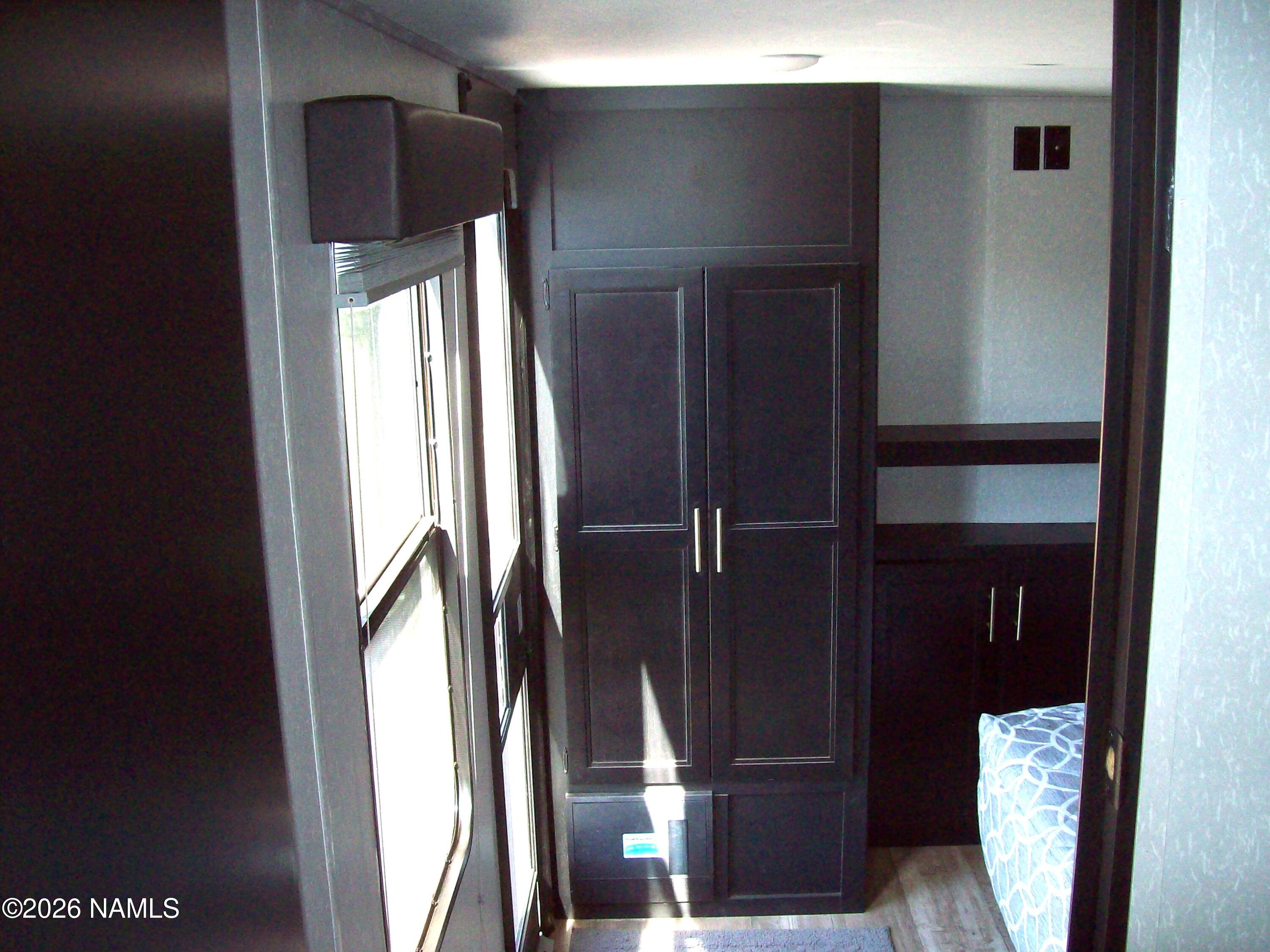 4063 East Woodland Ranch Road Williams, AZ 86046 - Photo 25 of 33 a view of elevator with hallway
