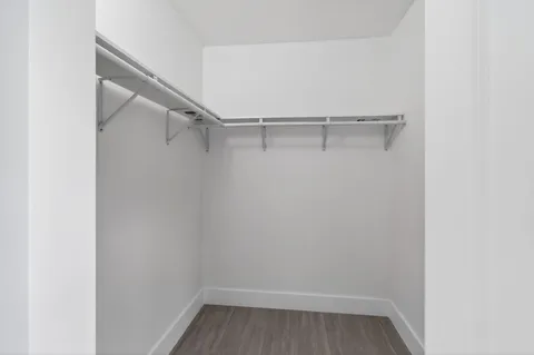 a view of an empty walk in closet