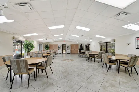 a view of a dining room with furniture