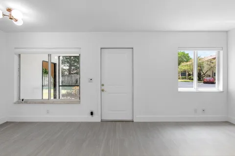 an empty room with windows