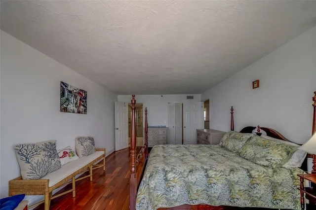 a bed room with a bed and a couch