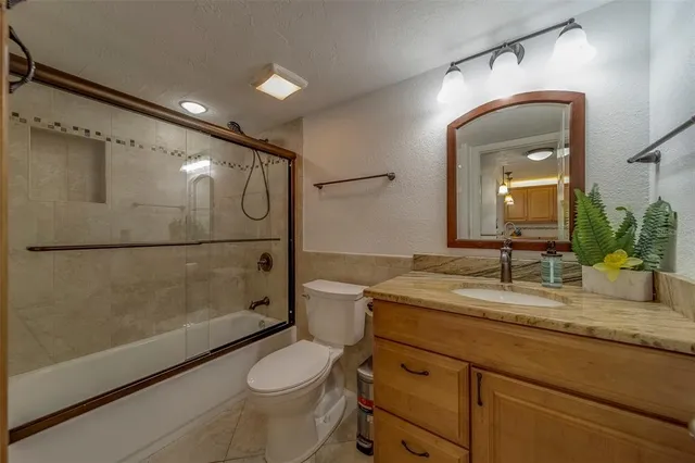 a view of a hallway with chairs