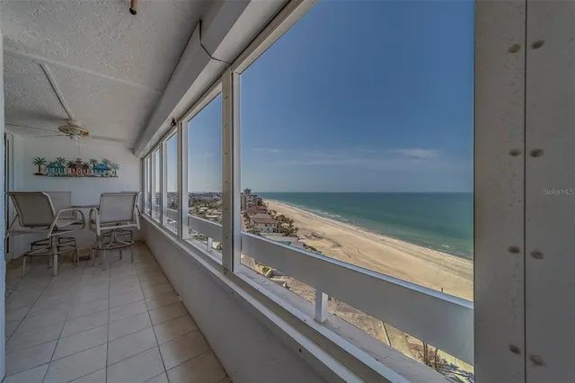 a view of balcony with chairs
