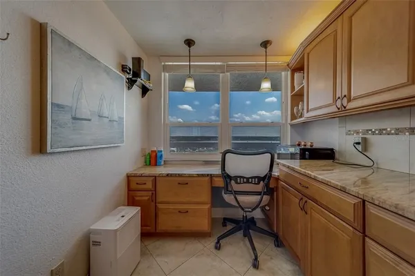 a room with cabinets and furniture