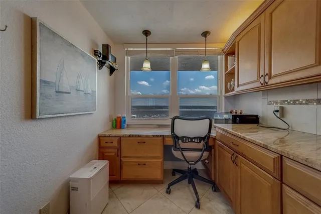 a room with cabinets and furniture