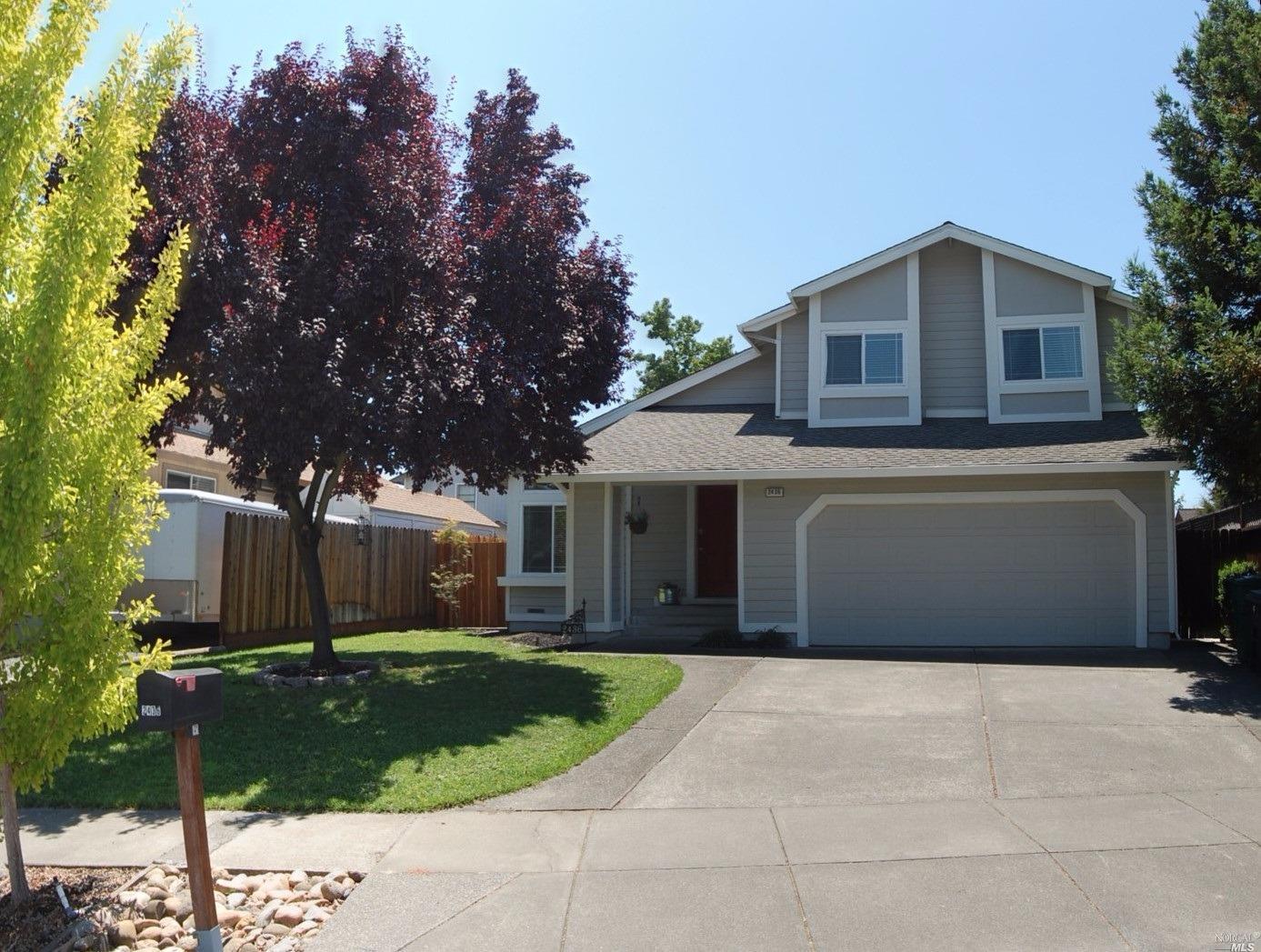 2436 Pinercrest Drive Santa Rosa, CA 95403 - Photo 1 of 1 a front view of a house with a garden and trees