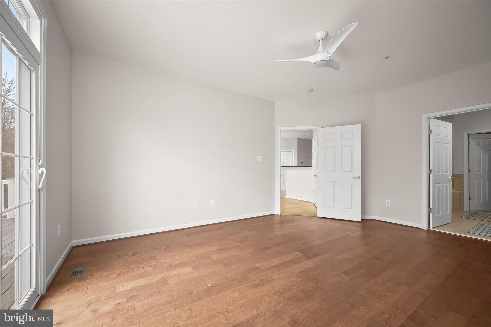 8736 Endless Ocean Way, Unit 24 Columbia, MD 21045 - Photo 21 of 61 an empty room with windows and closet