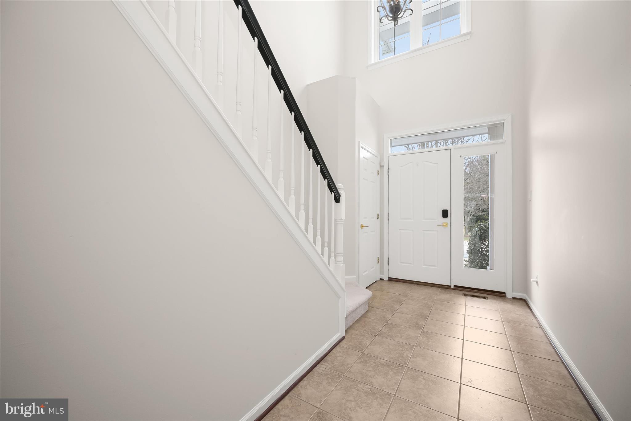 8736 Endless Ocean Way, Unit 24 Columbia, MD 21045 - Photo 3 of 61 a view of an entryway with staircase