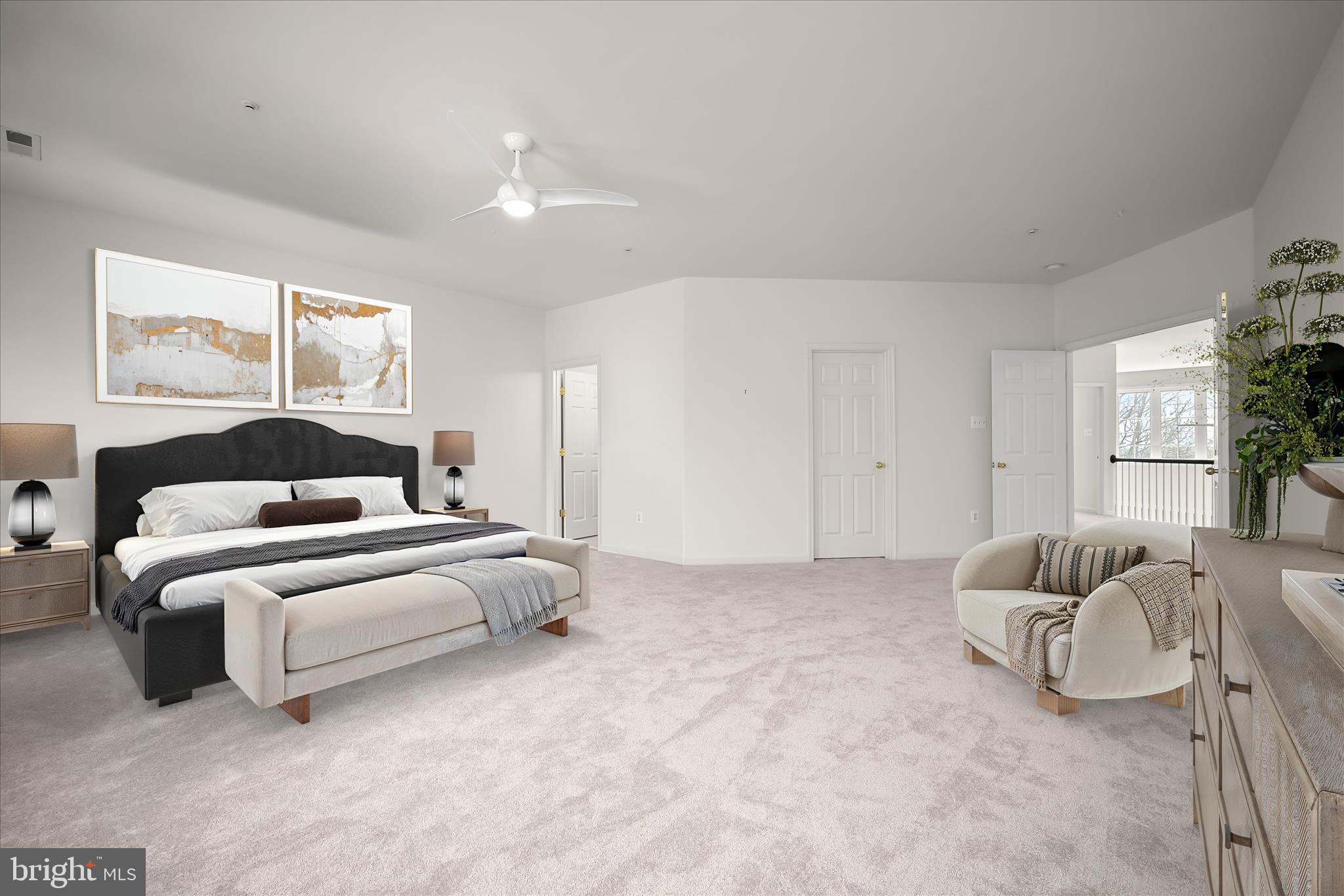 8736 Endless Ocean Way, Unit 24 Columbia, MD 21045 - Photo 31 of 61 a spacious bedroom with a bed and a couch