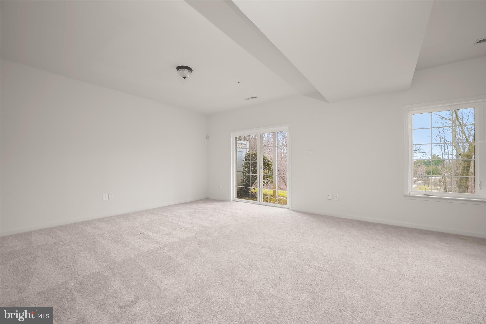 8736 Endless Ocean Way, Unit 24 Columbia, MD 21045 - Photo 45 of 61 a view of an empty room with a window