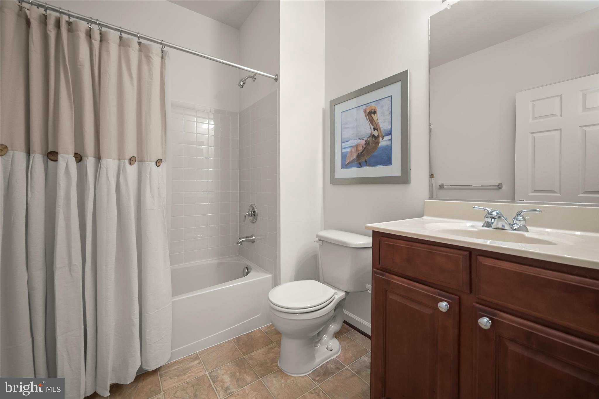 8736 Endless Ocean Way, Unit 24 Columbia, MD 21045 - Photo 50 of 61 a bathroom with a toilet a sink and a bathtub