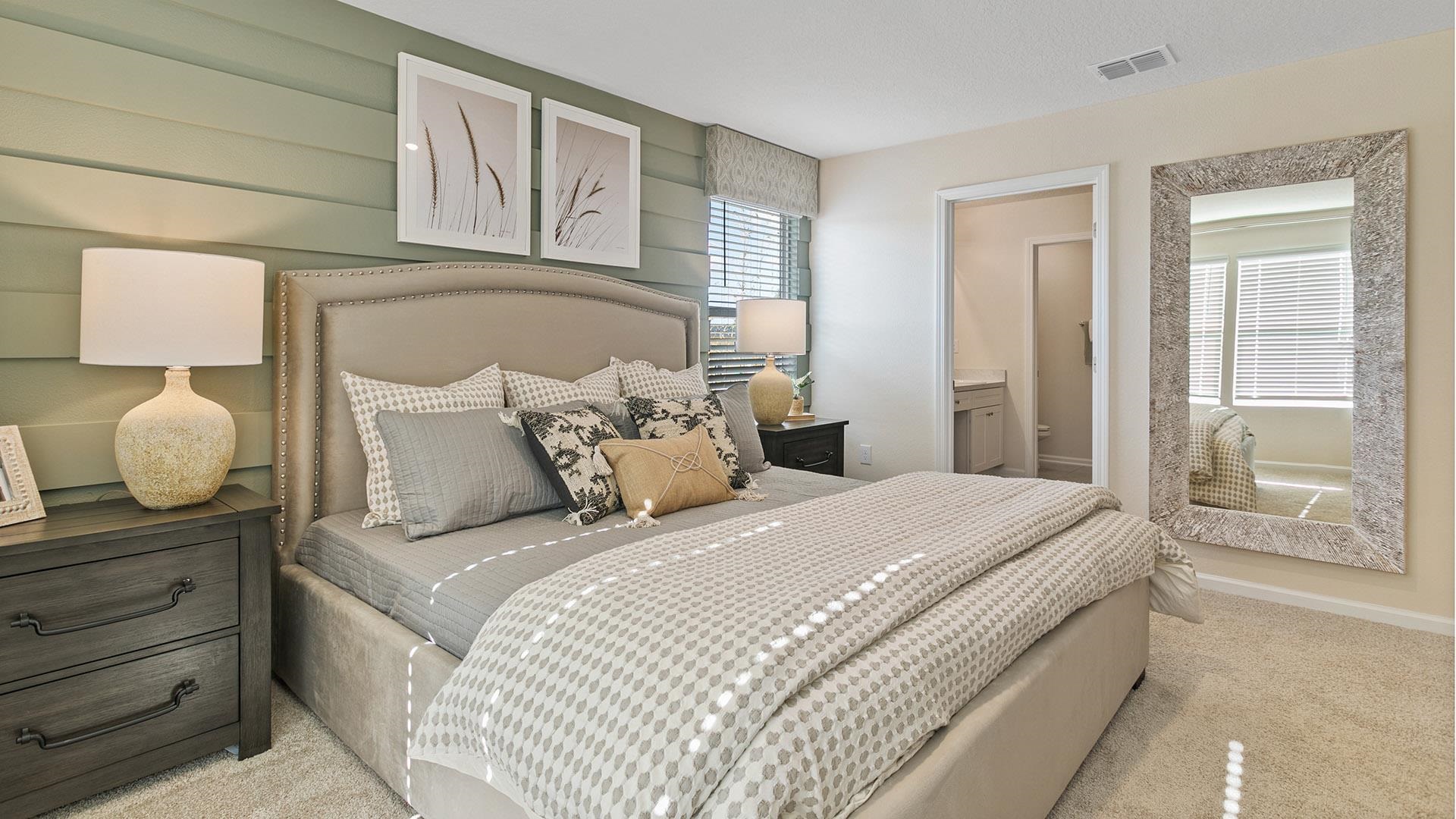 235 Redbud Road Palm Coast, FL 32137 - Photo 16 of 39 a bedroom with a bed and window