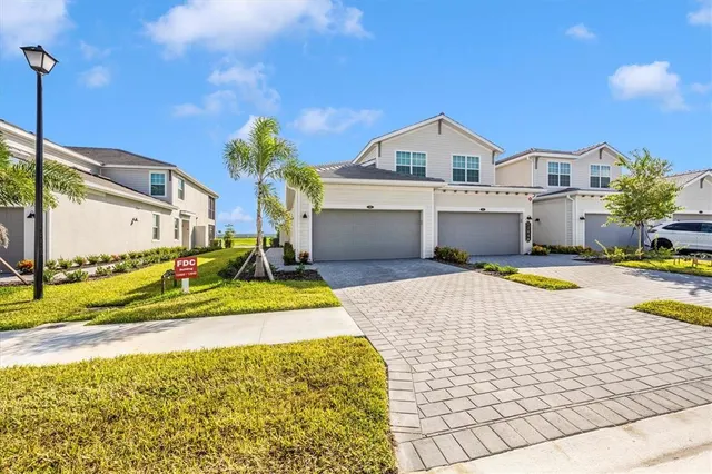 a view of a park with large trees
