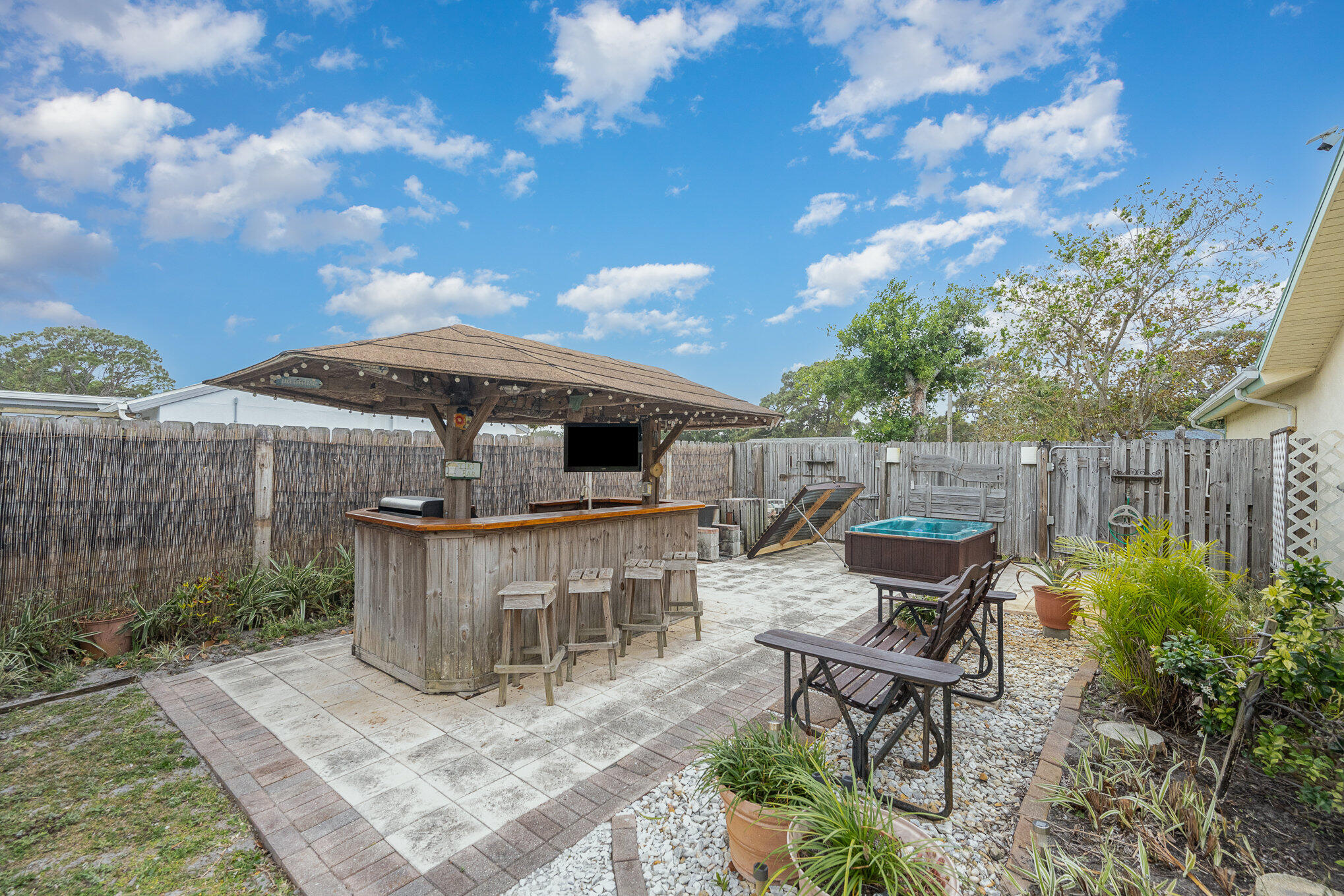 1562 Creel Road Northeast Palm Bay, FL 32905 - Photo 19 of 23 Tiki area and hot tub