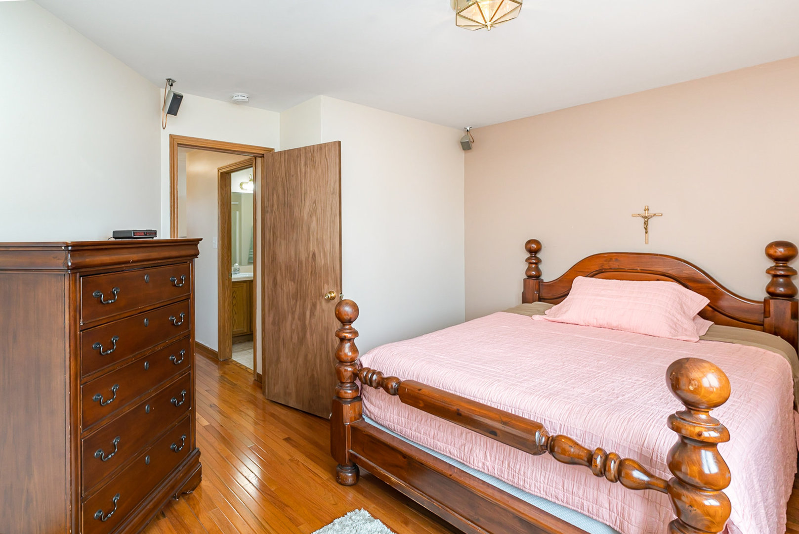 1560 Mallards Cove Beecher, IL 60401 - Photo 14 of 43 a bedroom with a bed and wooden floor