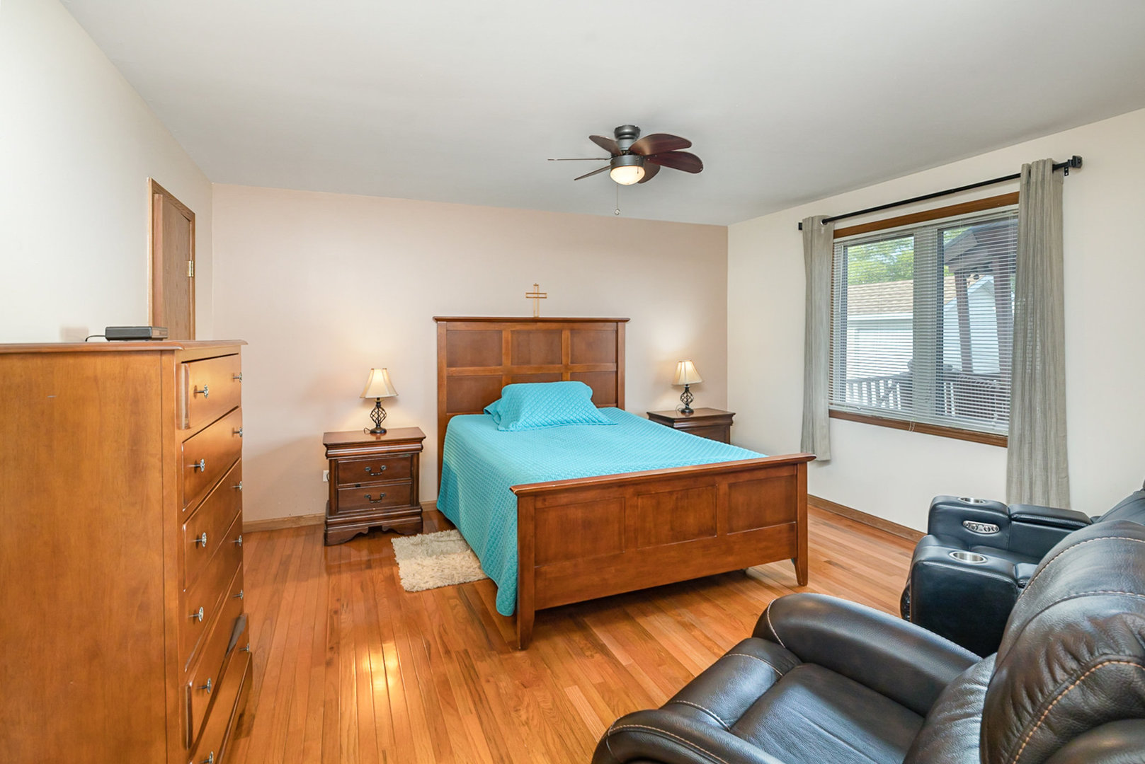 1560 Mallards Cove Beecher, IL 60401 - Photo 17 of 43 a bedroom with a bed and wooden floor