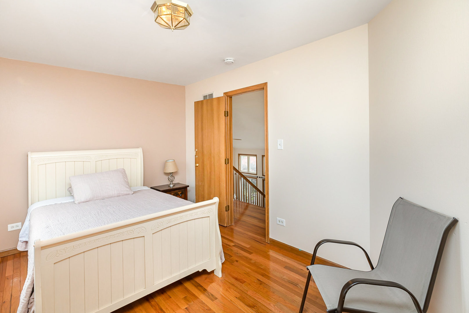 1560 Mallards Cove Beecher, IL 60401 - Photo 18 of 43 a bed room with a bed and a chair