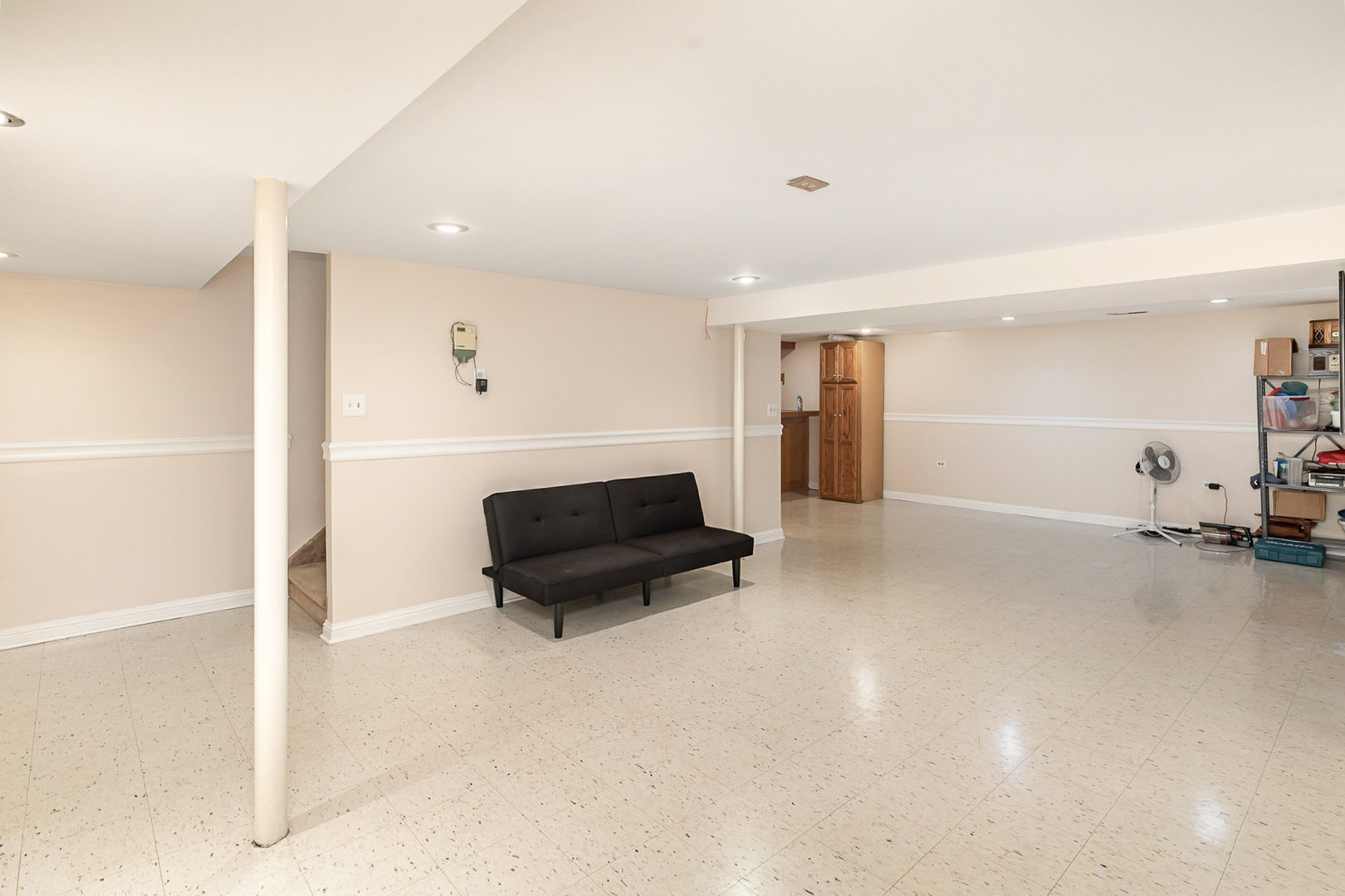 1560 Mallards Cove Beecher, IL 60401 - Photo 22 of 43 a living room with furniture a table and a refrigerator