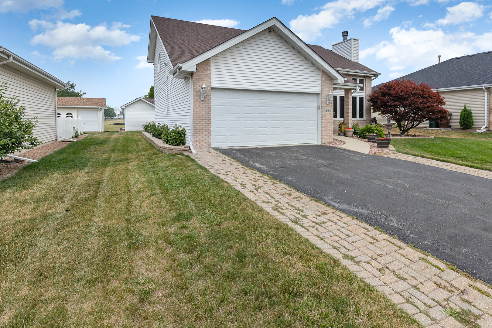 1560 Mallards Cove Beecher, IL 60401 - Photo 3 of 43 a view of a house with a yard