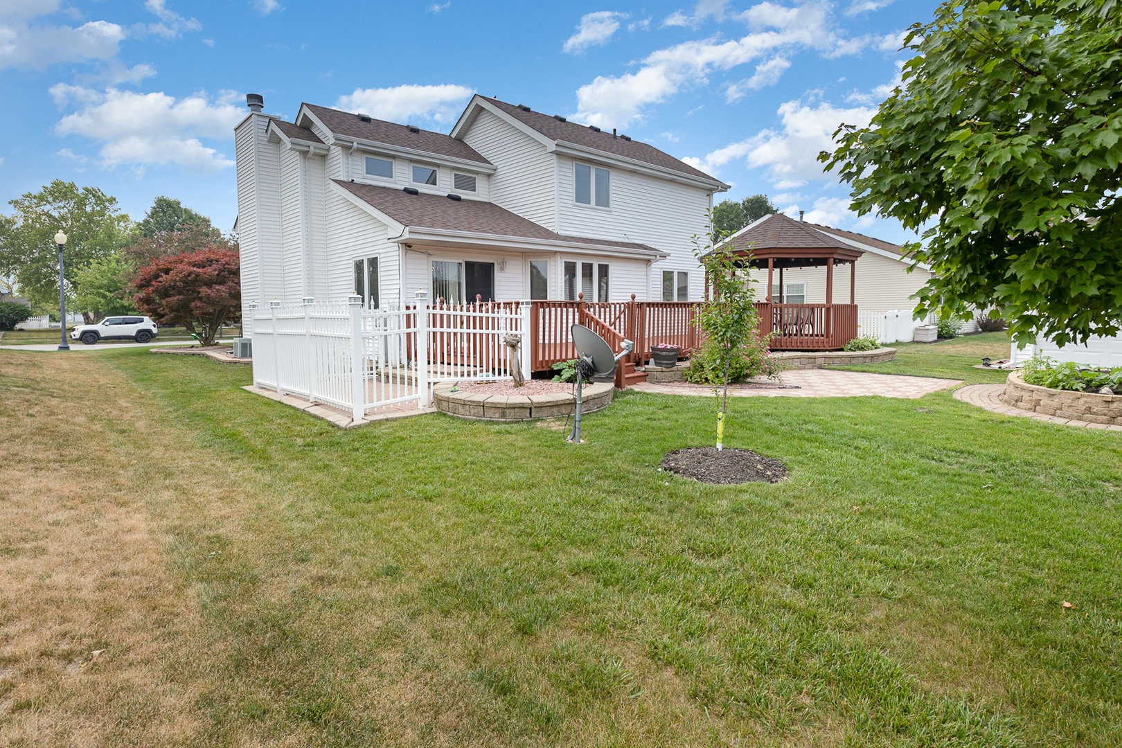 1560 Mallards Cove Beecher, IL 60401 - Photo 33 of 43 a front view of house with yard and green space