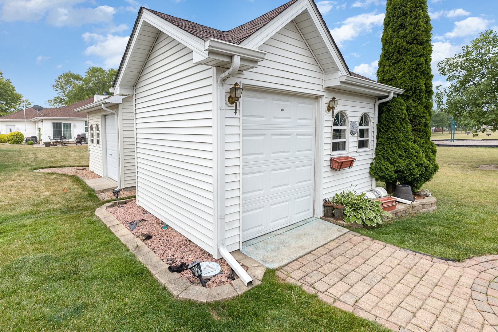 1560 Mallards Cove Beecher, IL 60401 - Photo 35 of 43 a front view of a house with a yard