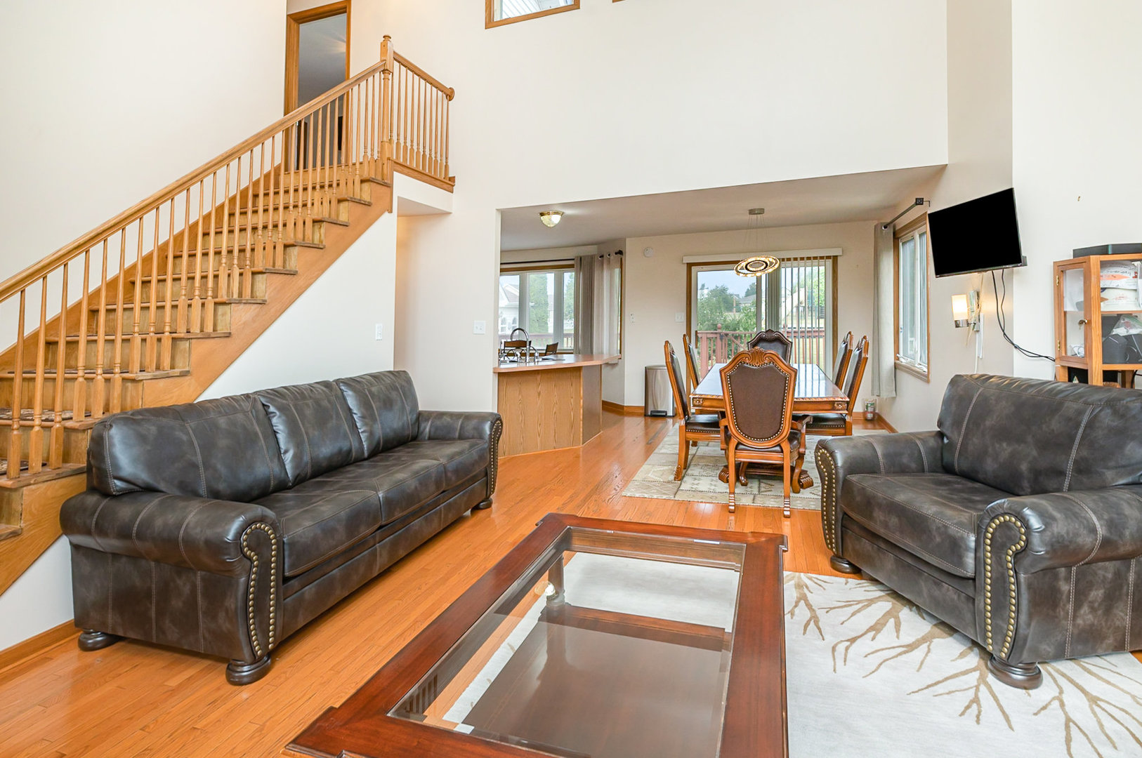1560 Mallards Cove Beecher, IL 60401 - Photo 7 of 43 a living room with furniture and a flat screen tv