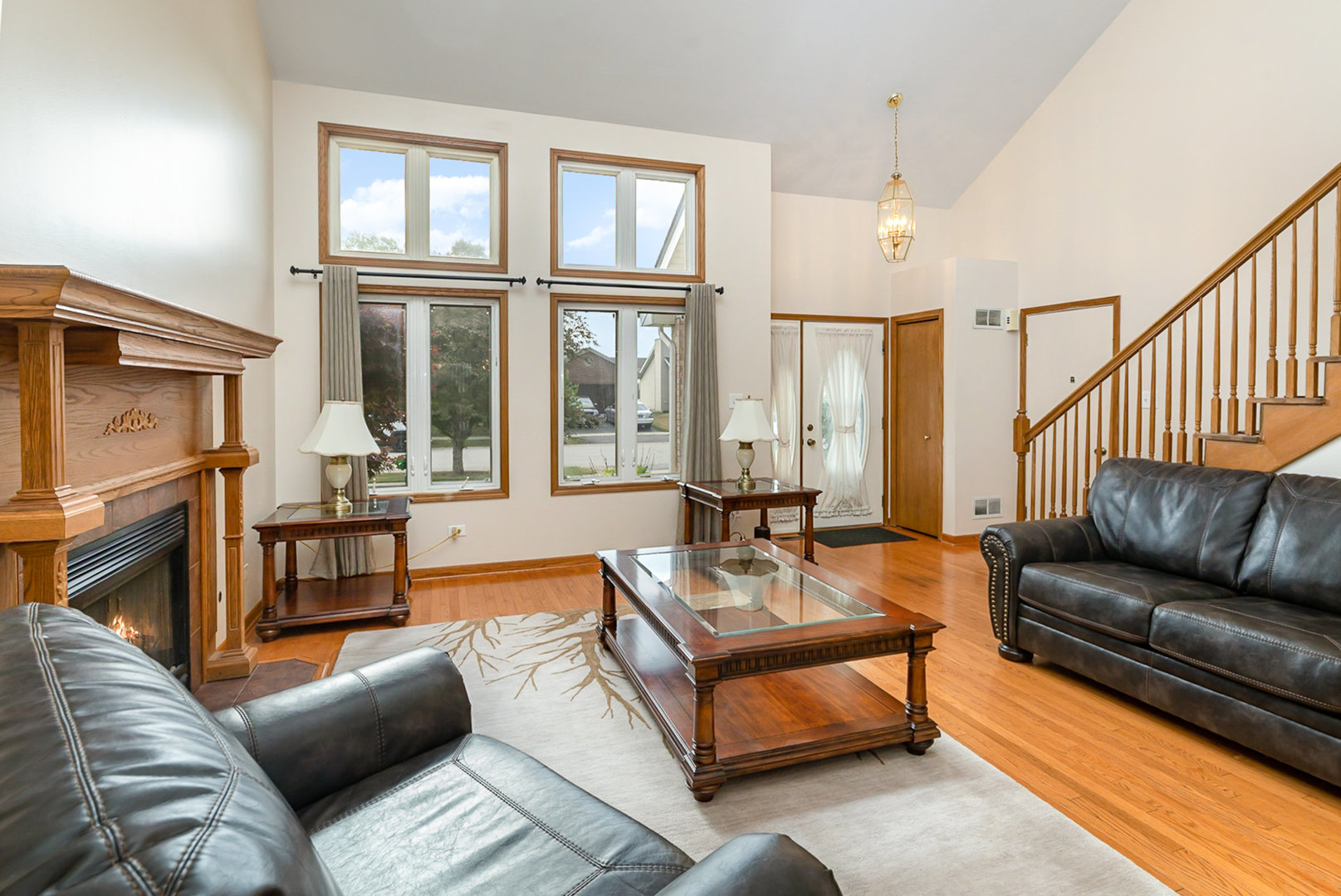 1560 Mallards Cove Beecher, IL 60401 - Photo 9 of 43 a living room with furniture ceiling fan and a window