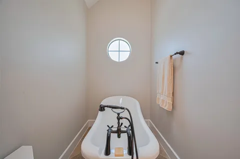 a view of staircase with white walls