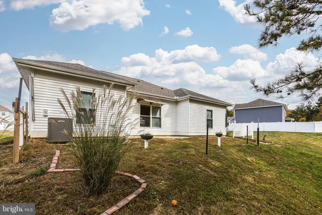 a house view with a backyard space