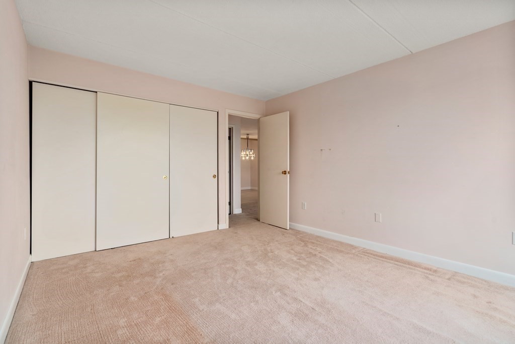 1550 Worcester Road, Unit 402 Framingham, MA 01702 - Photo 18 of 32 a view of an empty room