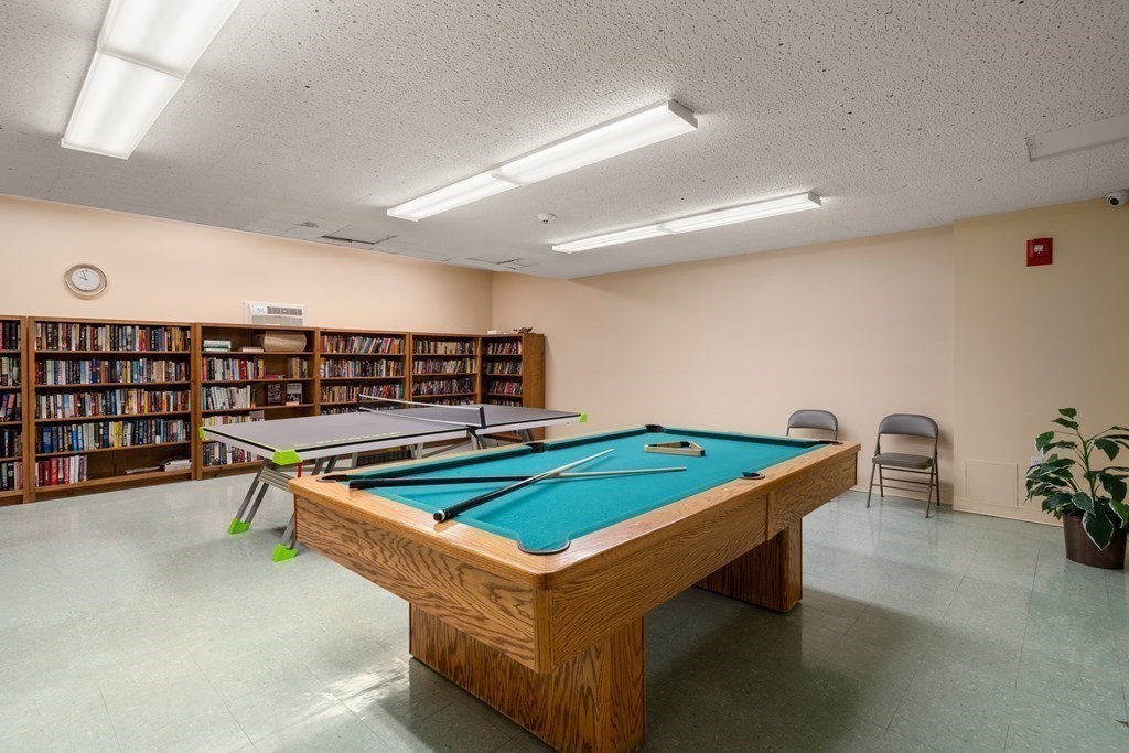 1550 Worcester Road, Unit 402 Framingham, MA 01702 - Photo 26 of 32 a room with pool table and table
