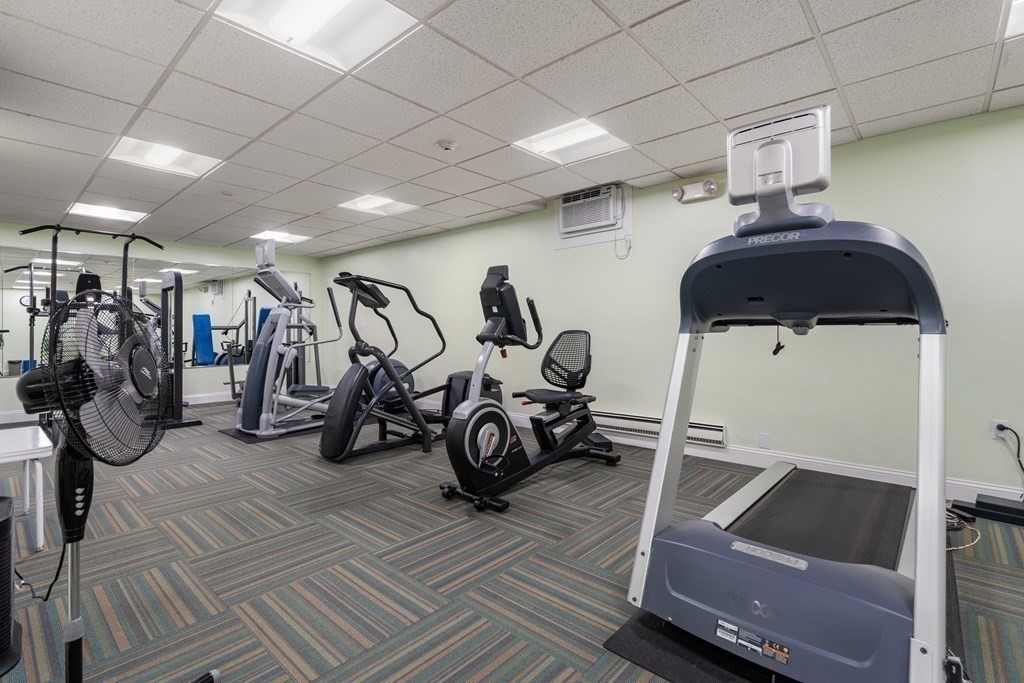 1550 Worcester Road, Unit 402 Framingham, MA 01702 - Photo 27 of 32 a view of a room with gym equipment