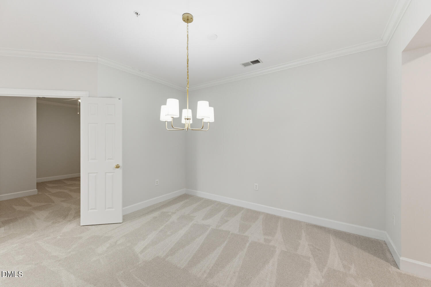 116 Northbrook Drive, Unit 204 Raleigh, NC 27609 - Photo 14 of 94 a view of a chandelier in a room