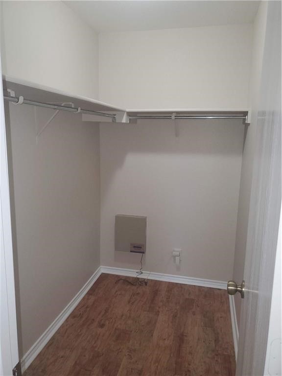 551 New Country Road Kyle, TX 78640 - Photo 14 of 34 a view of an empty walk in closet