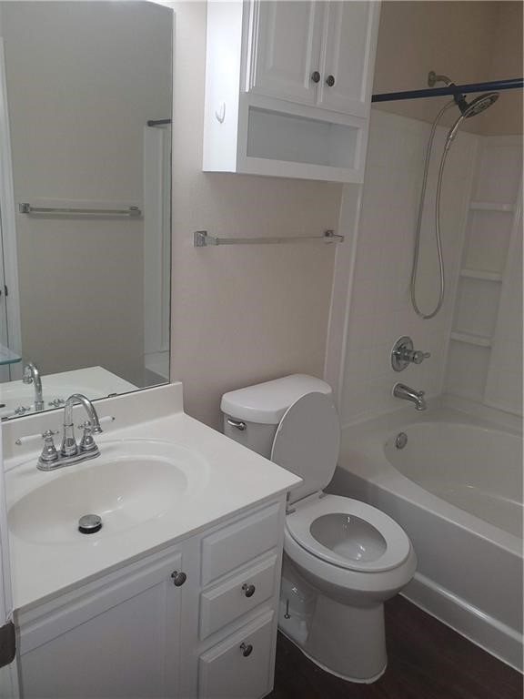 551 New Country Road Kyle, TX 78640 - Photo 15 of 34 a bathroom with a sink a toilet and shower