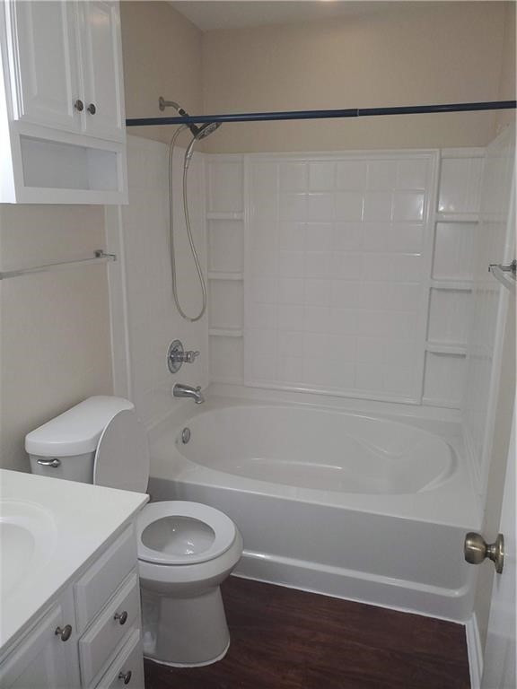 551 New Country Road Kyle, TX 78640 - Photo 16 of 34 a bathroom with a toilet and a shower