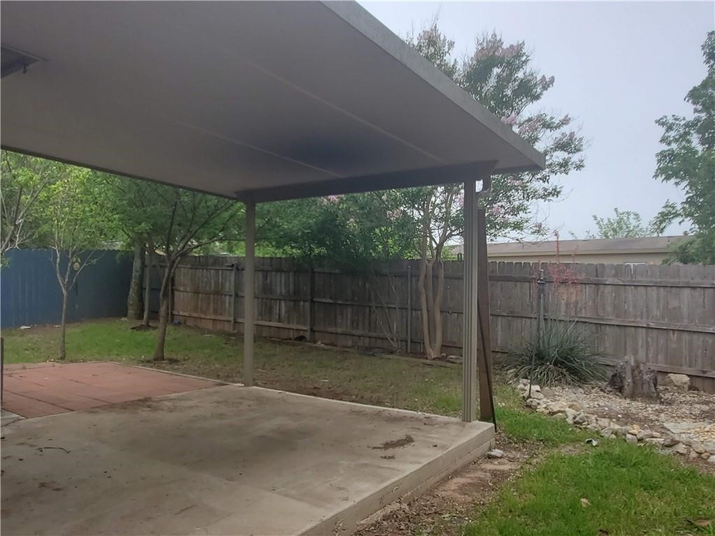 551 New Country Road Kyle, TX 78640 - Photo 28 of 34 a view of backyard with green space