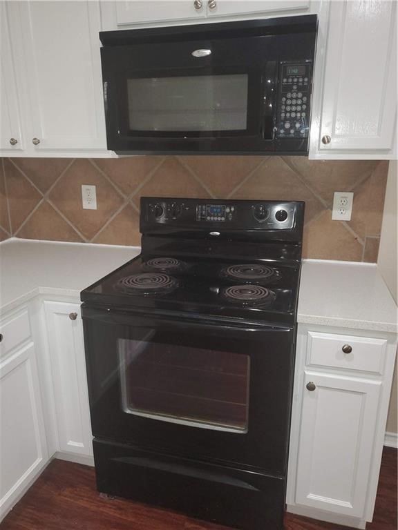 551 New Country Road Kyle, TX 78640 - Photo 10 of 34 a stove top oven sitting inside of a kitchen